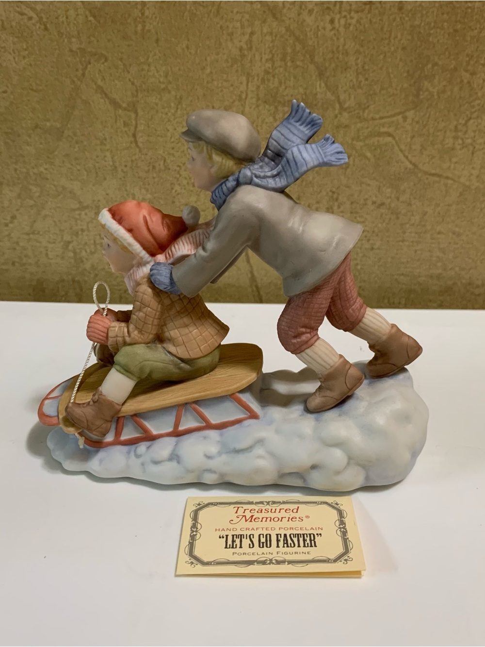 Enesco Treasured Memories Let’s Go Faster Porcelain Figurine of 2 boys snow sled